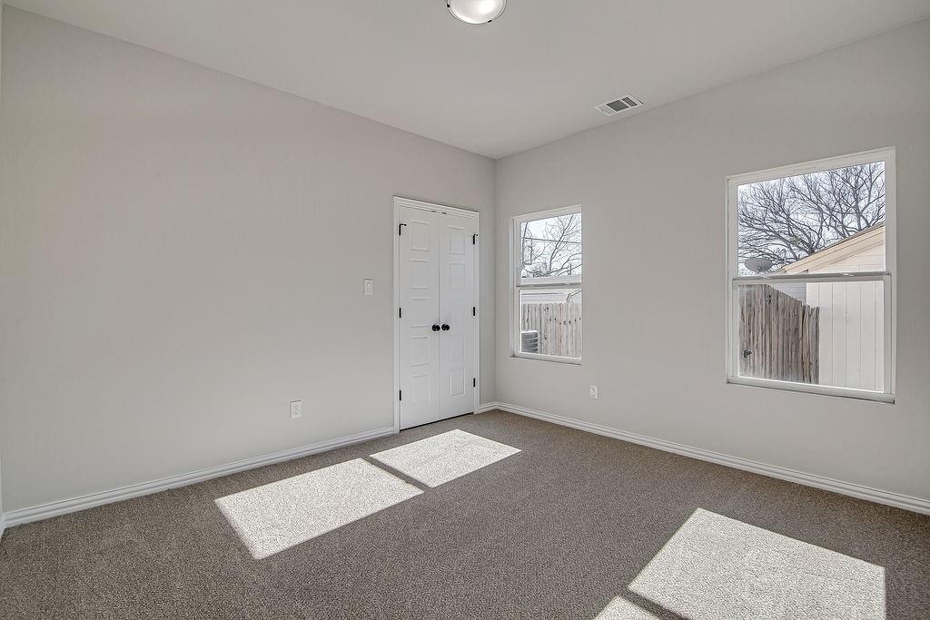 1520 Whippoorwill Way Azle, TX 76020 - Photo 19 of 25 an empty room with windows