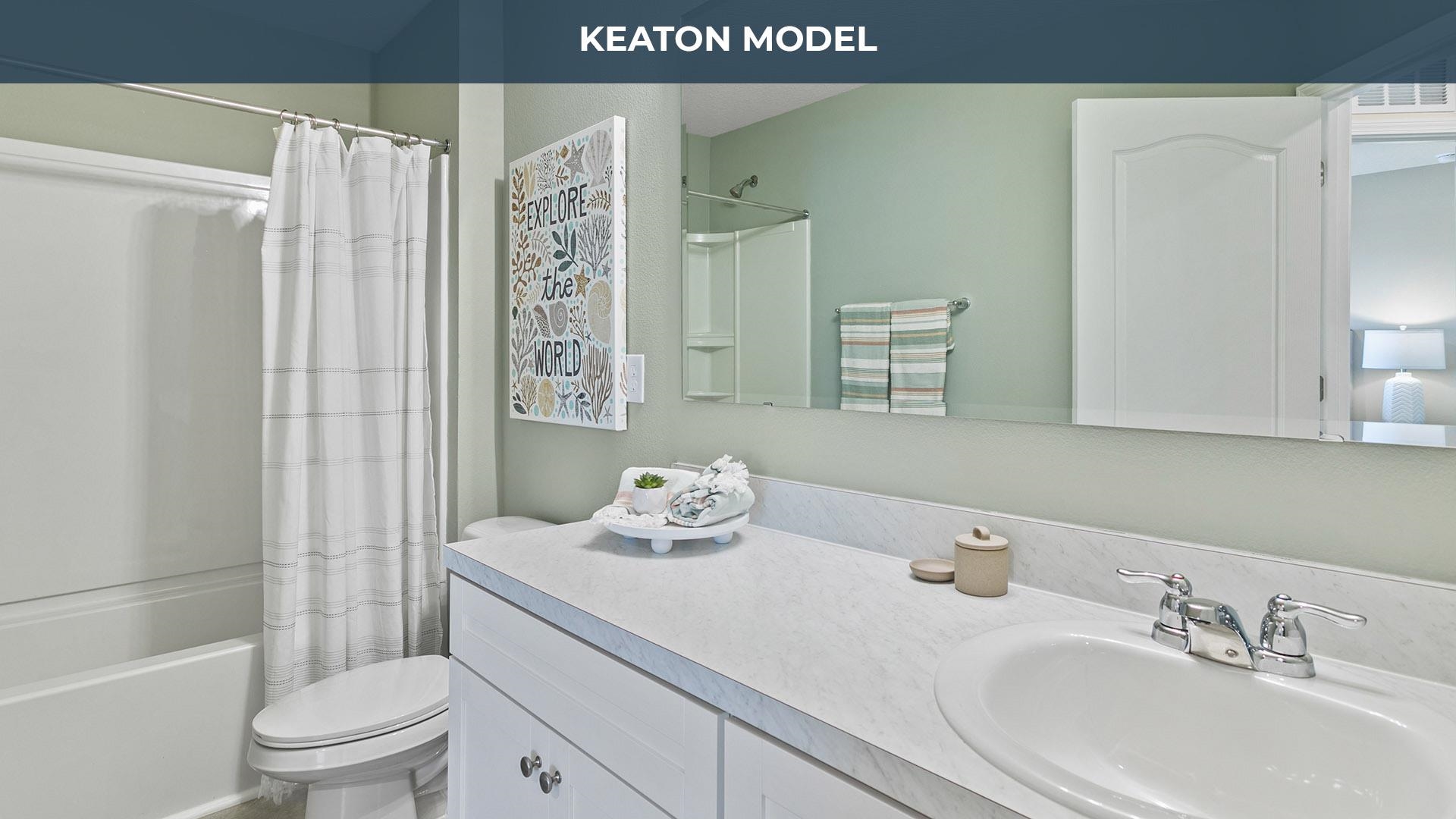 460 Redbud Road Palm Coast, FL 32137 - Photo 20 of 34 a bathroom with a sink a toilet and shower curtain