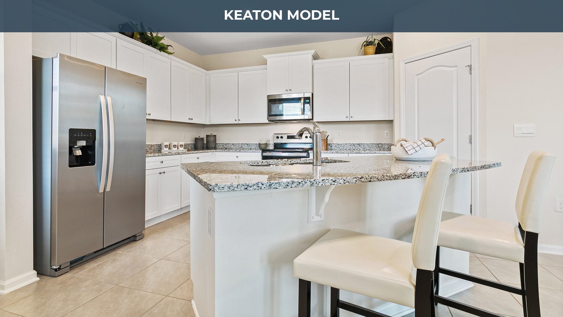 460 Redbud Road Palm Coast, FL 32137 - Photo 5 of 34 a kitchen with stainless steel appliances granite countertop a refrigerator a sink a stove a dining table and chairs