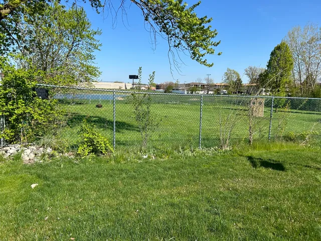 a view of a garden with a lake