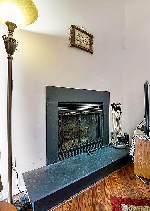 30 Sycamore Court Highland Mills, NY 10930 - Photo 12 of 12 a living room with furniture and a fireplace