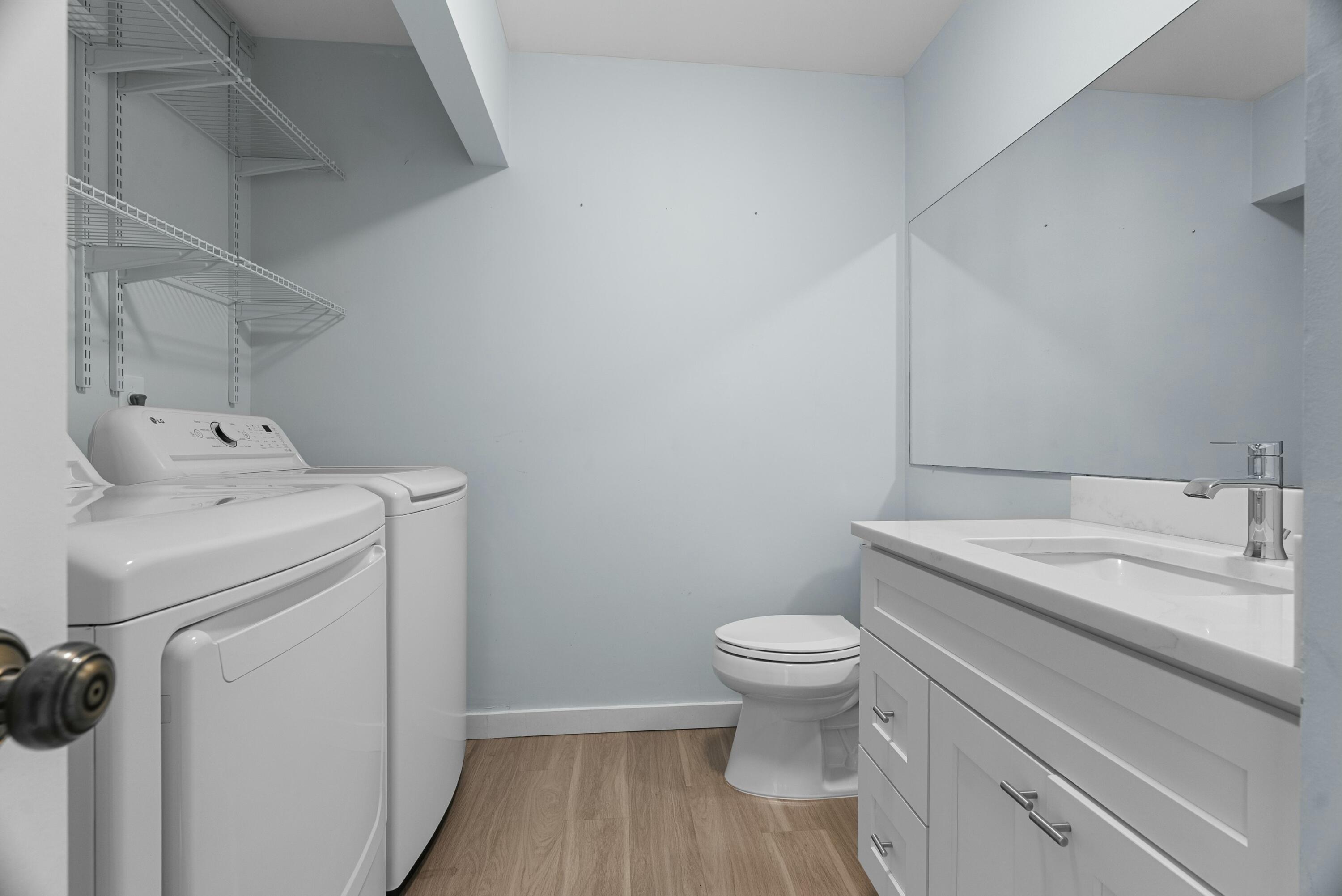 210 Ocean Dunes Circle Jupiter, FL 33477 - Photo 15 of 43 a view of bathroom with a sink and toilet