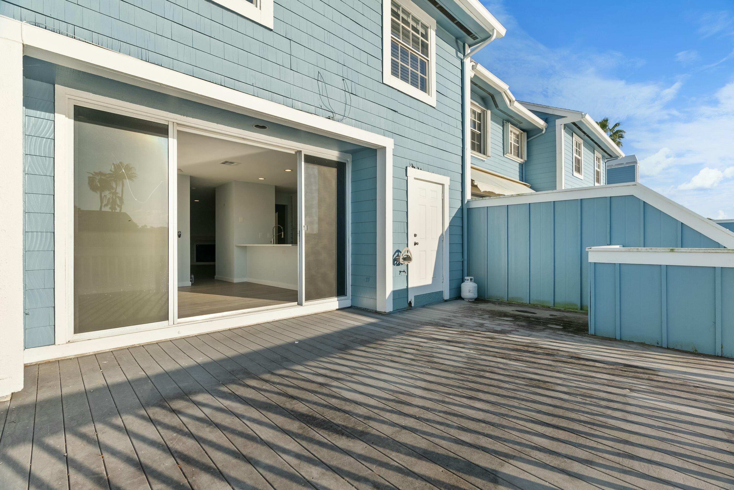 210 Ocean Dunes Circle Jupiter, FL 33477 - Photo 24 of 43 a view of a house with a door