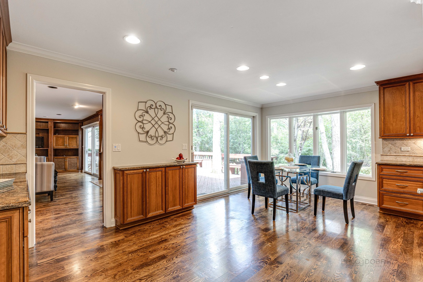 755 Smoke Tree Road Deerfield, IL 60015 - Photo 13 of 35 a view of a a dining room with furniture window and wooden floor
