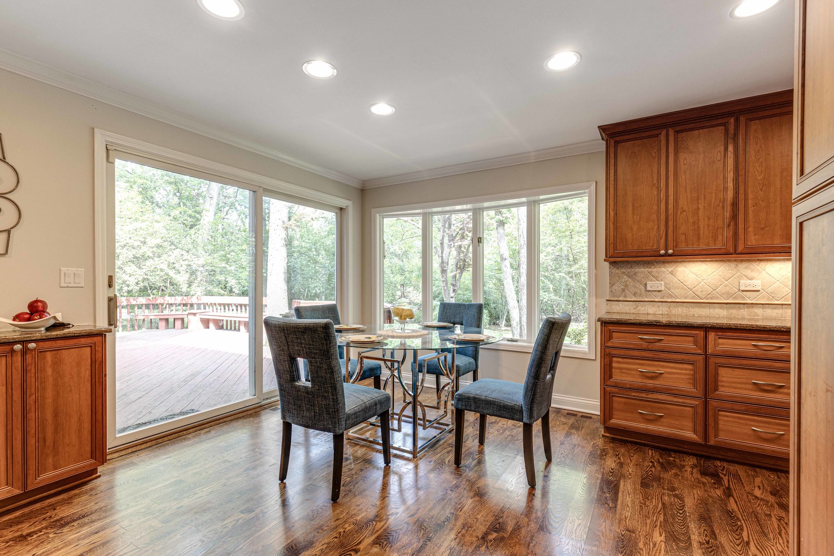 755 Smoke Tree Road Deerfield, IL 60015 - Photo 14 of 35 a view of a dining room with furniture and wooden floor