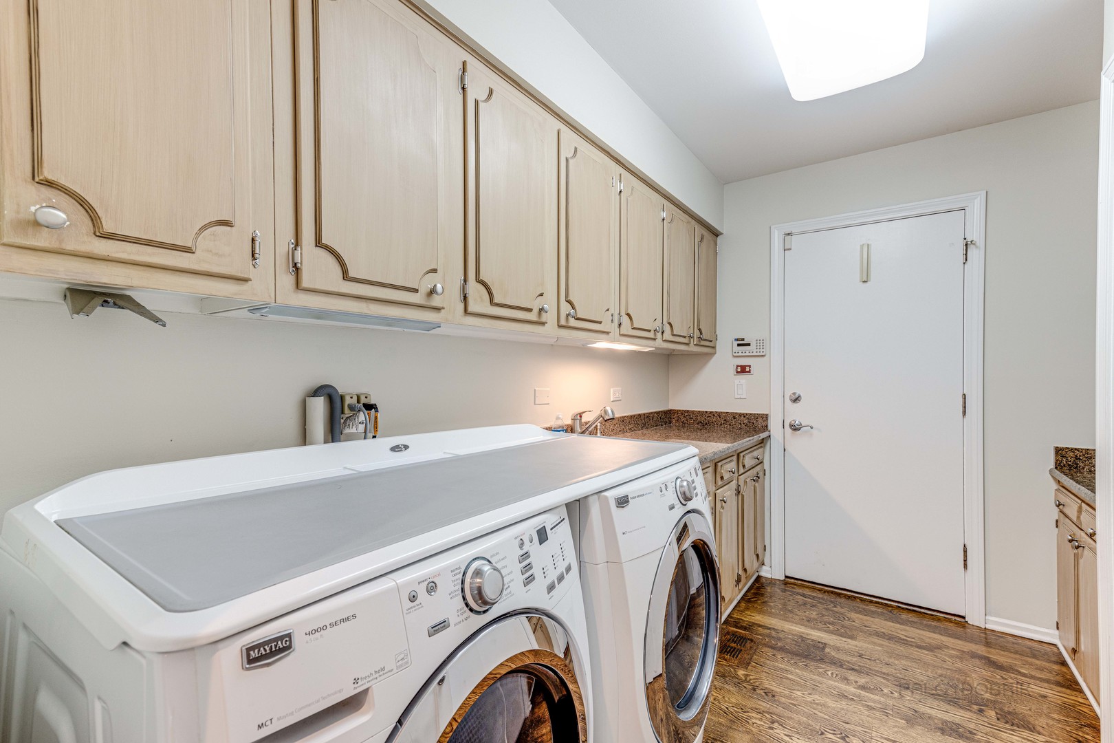 755 Smoke Tree Road Deerfield, IL 60015 - Photo 19 of 35 a utility room with dryer and washer
