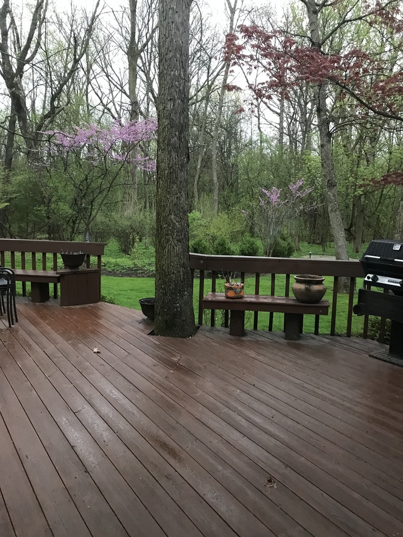755 Smoke Tree Road Deerfield, IL 60015 - Photo 32 of 35 a view of a wooden floor with a bench