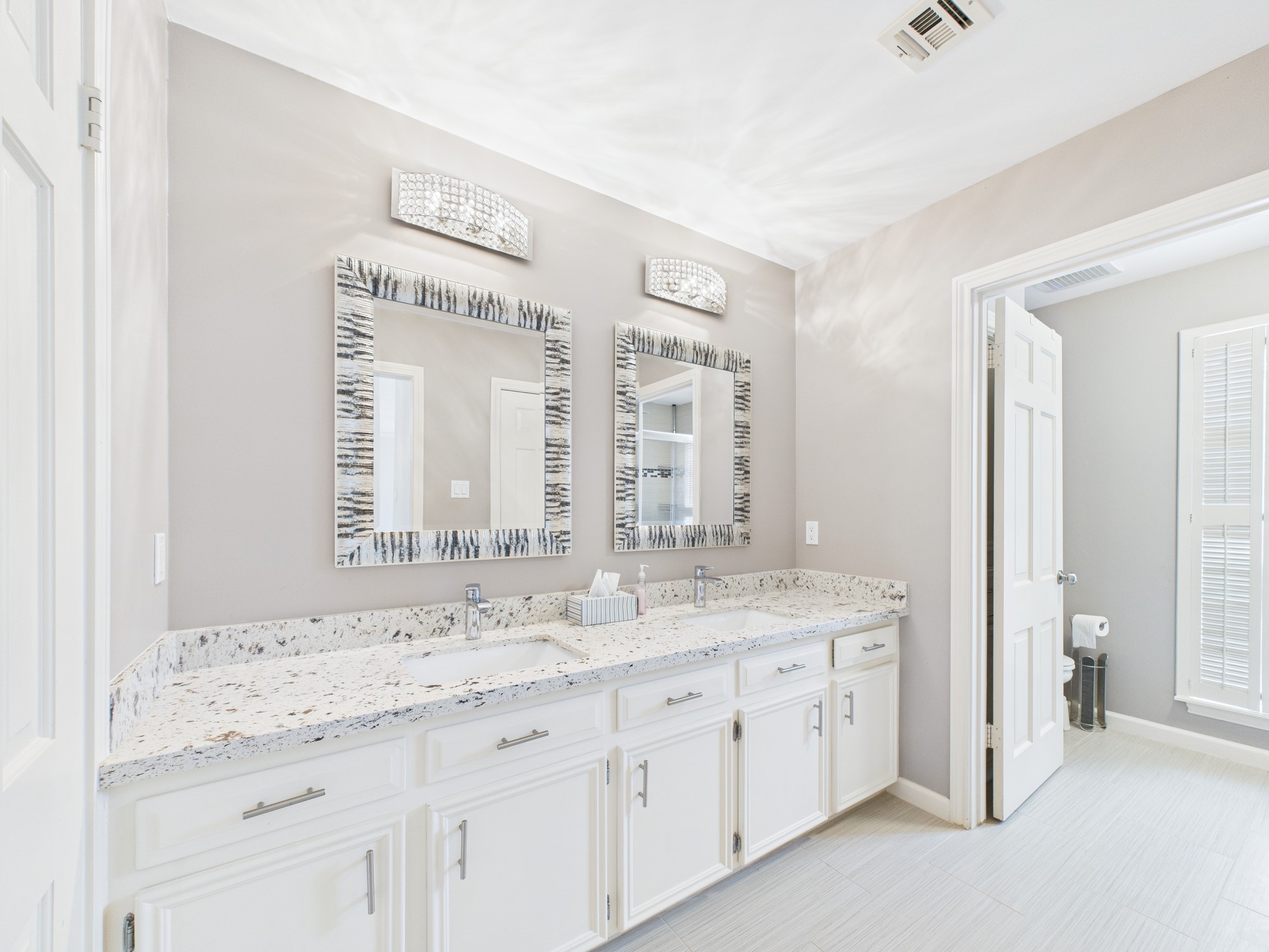 702 Daria Court Houston, TX 77079 - Photo 28 of 44 Nicely Appointed Primary Vanity with Dual Sink and Oversized Vanity
