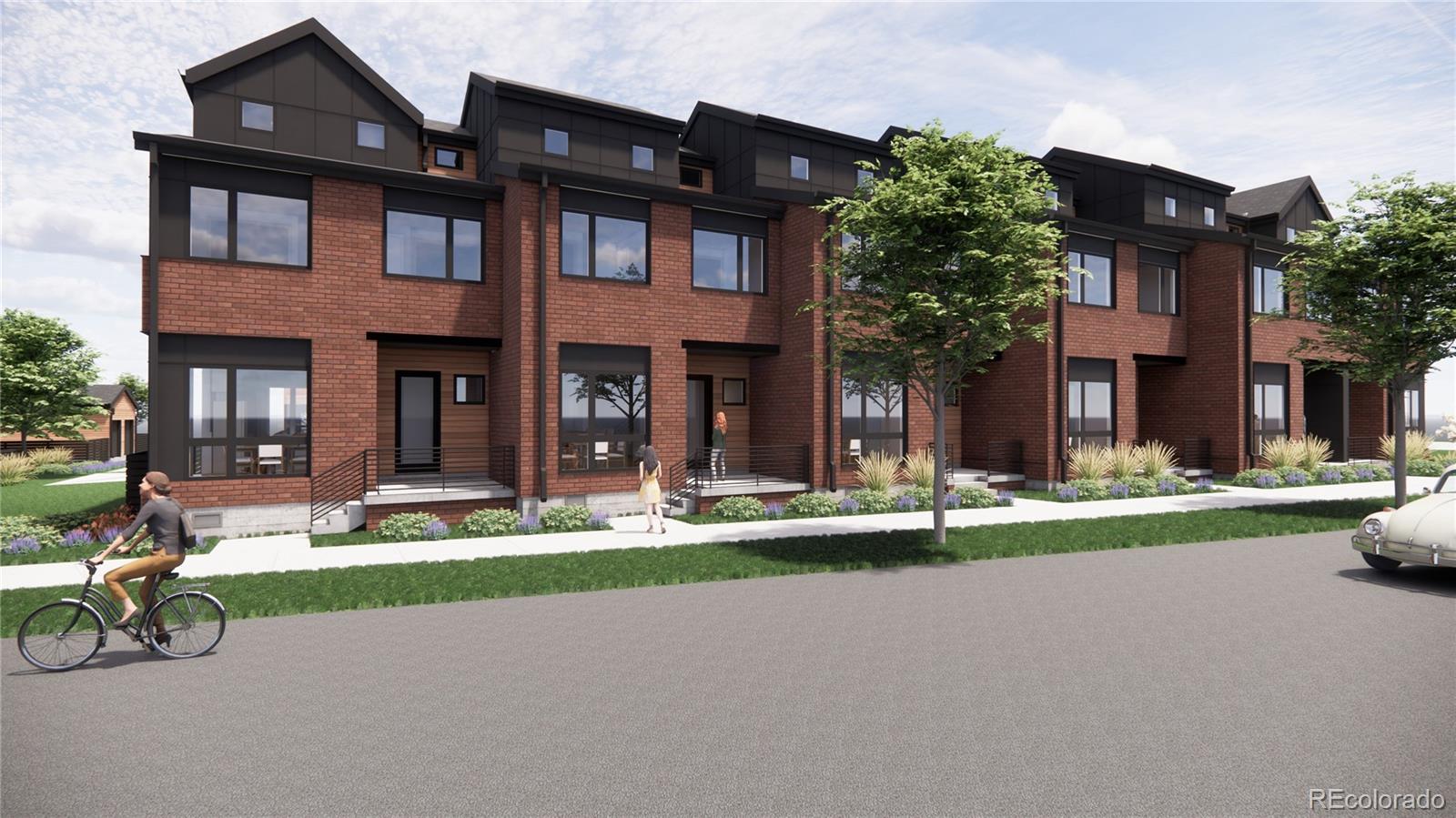 front view of a brick building with a yard