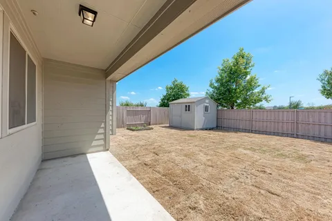 a bathroom with a tub and shower