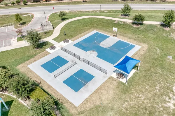 a view of swimming pool with seating area
