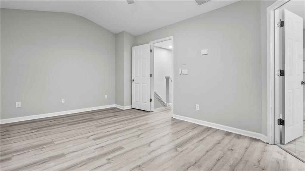 2793 Keystone Avenue Lithonia, GA 30058 - Photo 24 of 33 a view of an empty room and wooden floor
