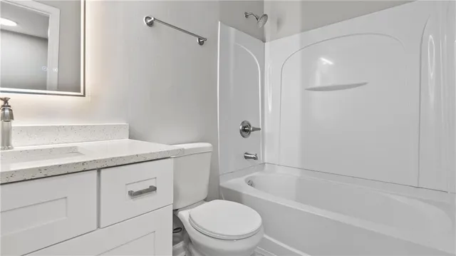 a bathroom with a sink and a toilet