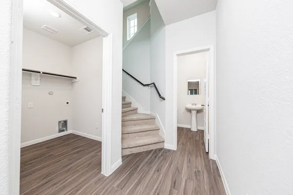 a view of entryway with wooden floor