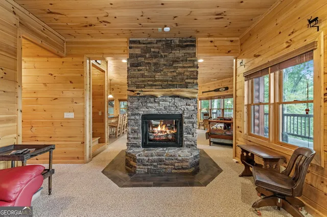 a view of front door of house with wooden floor
