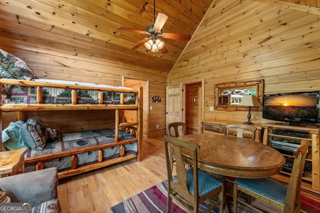 a view of a livingroom with furniture and a fireplace