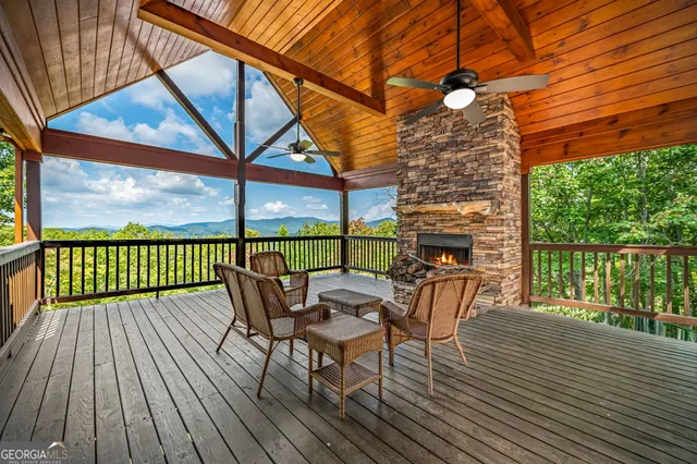 a bathroom with a granite countertop toilet sink and shower