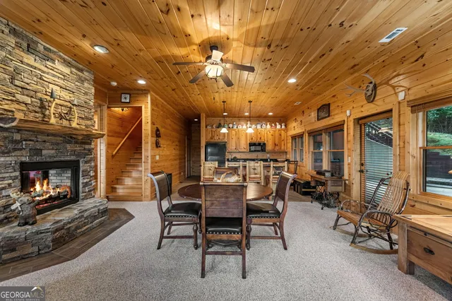 a balcony filled with furniture and wooden floor