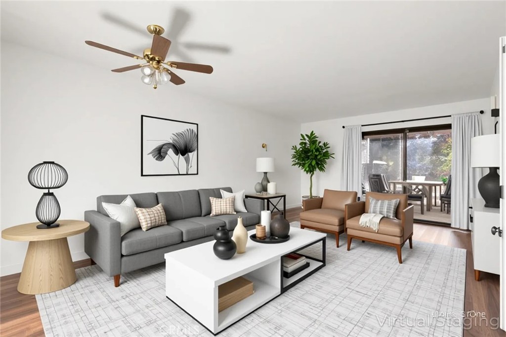 1420 Sherman Avenue, Unit 27 Chico, CA 95926 - Photo 15 of 29 a living room with furniture and a large window