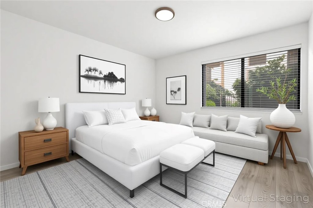 1420 Sherman Avenue, Unit 27 Chico, CA 95926 - Photo 23 of 29 a bedroom with a bed and a couch