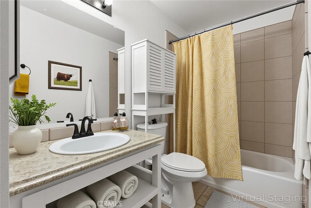 1420 Sherman Avenue, Unit 27 Chico, CA 95926 - Photo 25 of 29 a bathroom with a granite countertop sink and a mirror