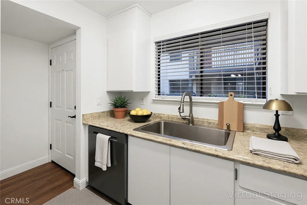 1420 Sherman Avenue, Unit 27 Chico, CA 95926 - Photo 5 of 29 a kitchen with stainless steel appliances granite countertop a sink and a window