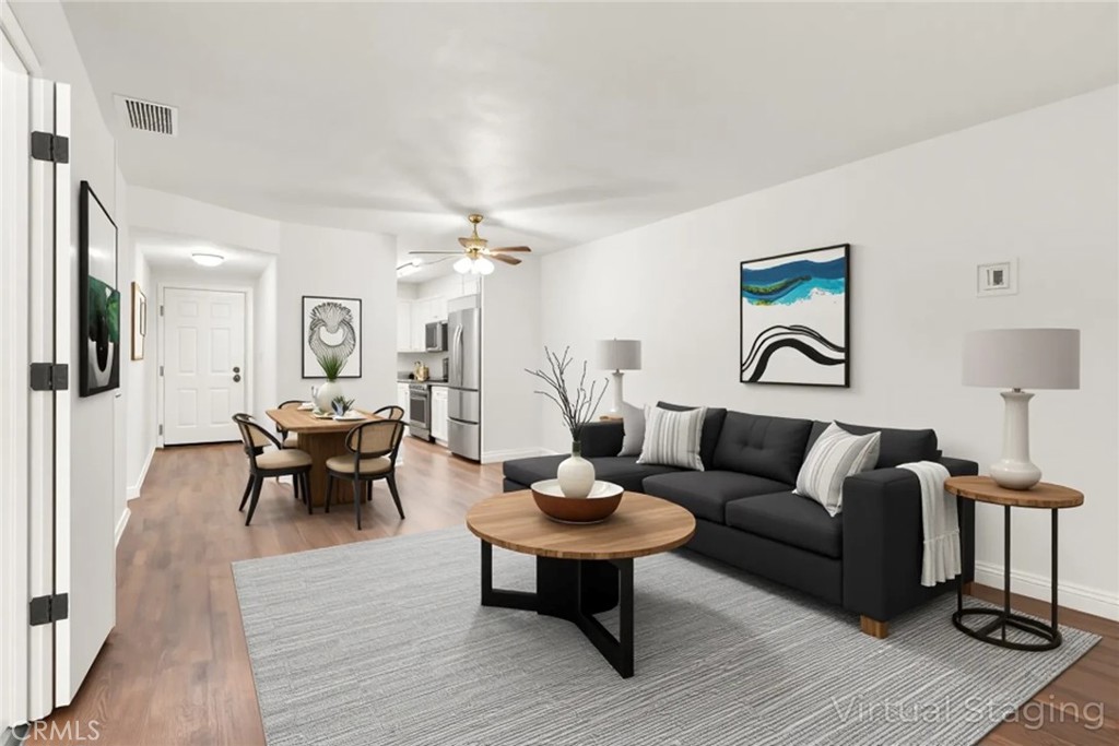 1420 Sherman Avenue, Unit 27 Chico, CA 95926 - Photo 8 of 29 a living room with furniture and wooden floor