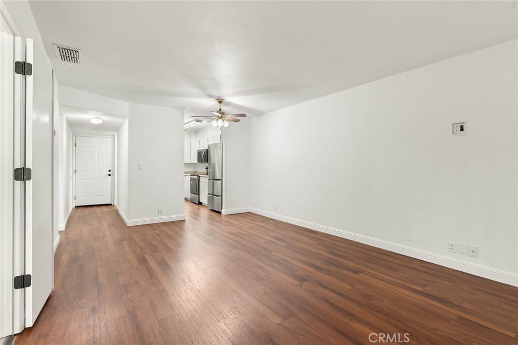 1420 Sherman Avenue, Unit 27 Chico, CA 95926 - Photo 9 of 29 wooden floor in an empty room