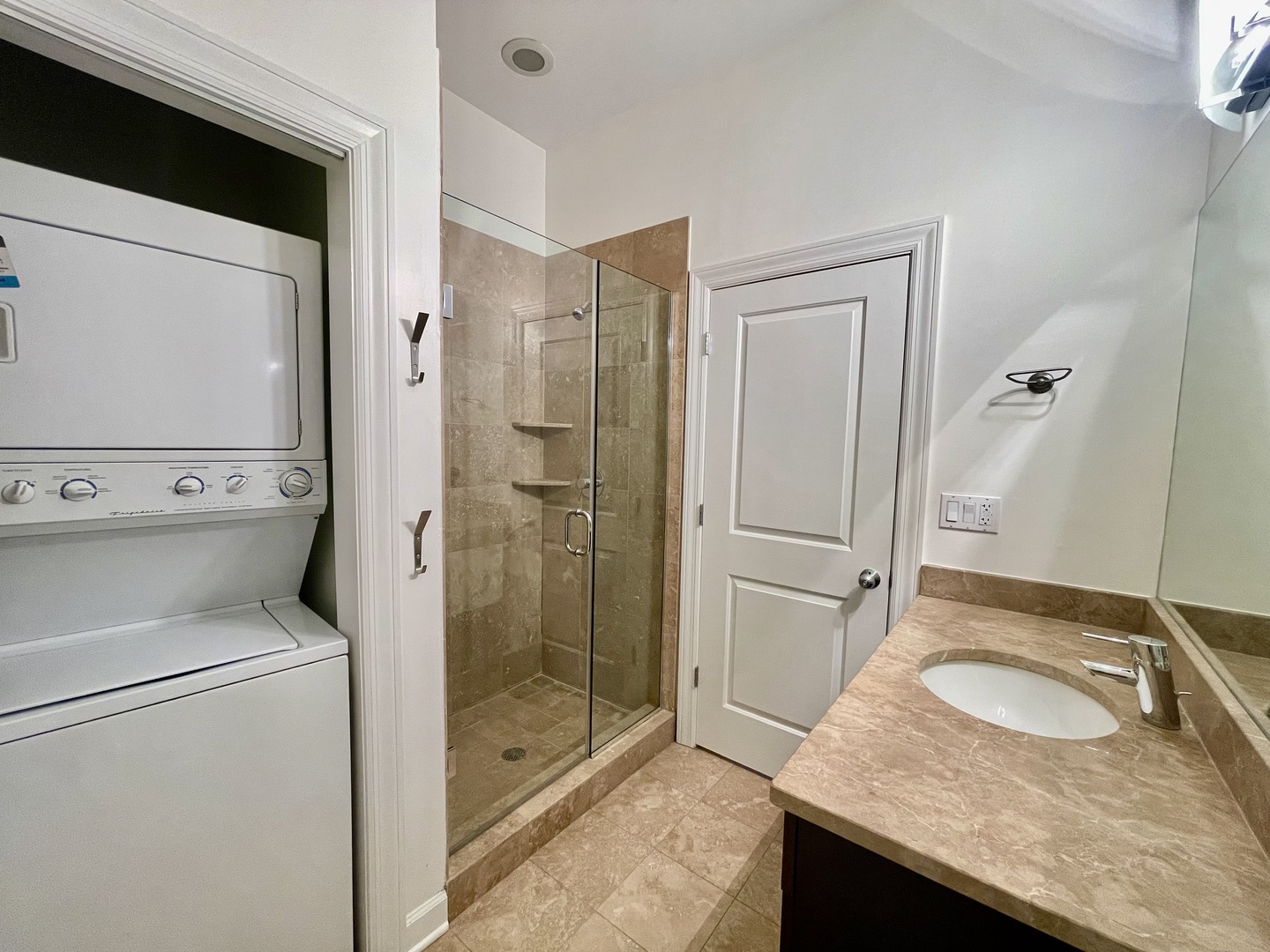 1746 West Division Street, Unit 3 Chicago, IL 60622 - Photo 15 of 20 a bathroom with a granite countertop sink a toilet and shower