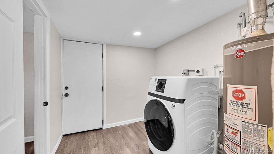 3984 Cook Street Denver, CO 80205 - Photo 16 of 34 a utility room with dryer and washer