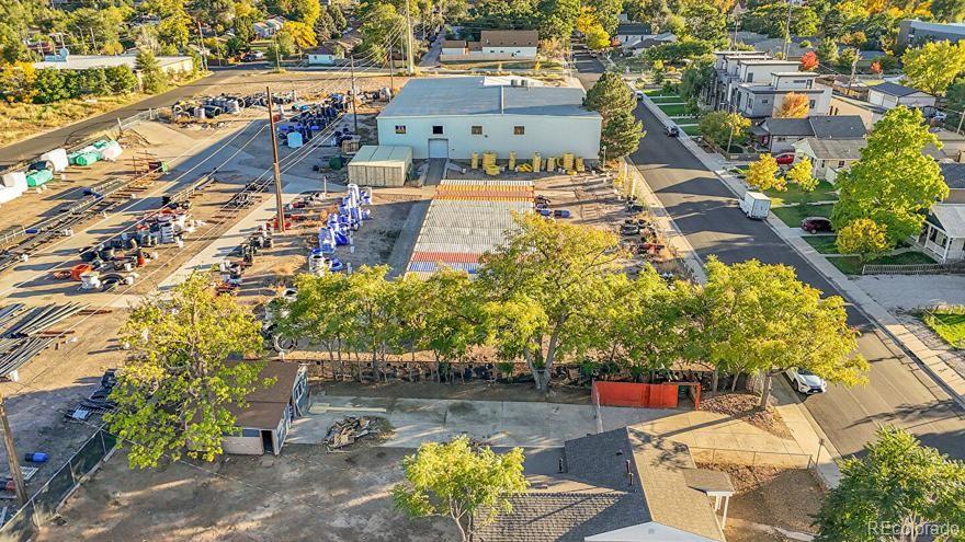 3984 Cook Street Denver, CO 80205 - Photo 23 of 34 a view of a swimming pool with a patio