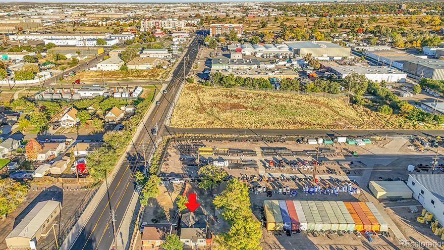 3984 Cook Street Denver, CO 80205 - Photo 28 of 34 an aerial view of residential building and an ocean view