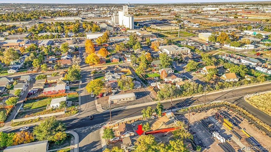 3984 Cook Street Denver, CO 80205 - Photo 29 of 34 an aerial view of residential houses with outdoor space