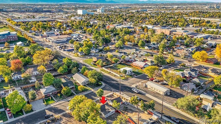 3984 Cook Street Denver, CO 80205 - Photo 30 of 34 an aerial view of residential houses with outdoor space