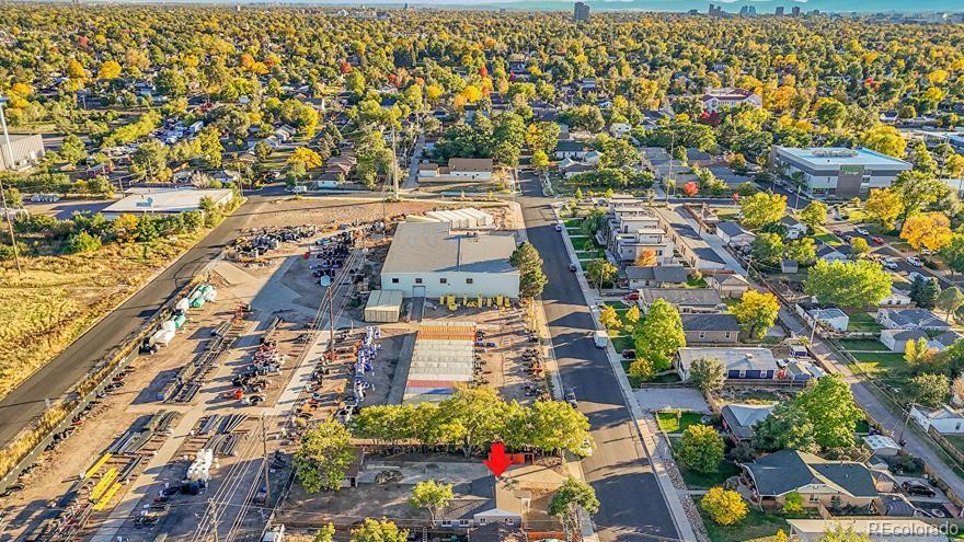 3984 Cook Street Denver, CO 80205 - Photo 32 of 34 an aerial view of residential building and car parked