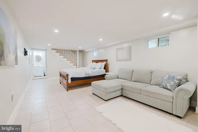 a living room with furniture and a couch
