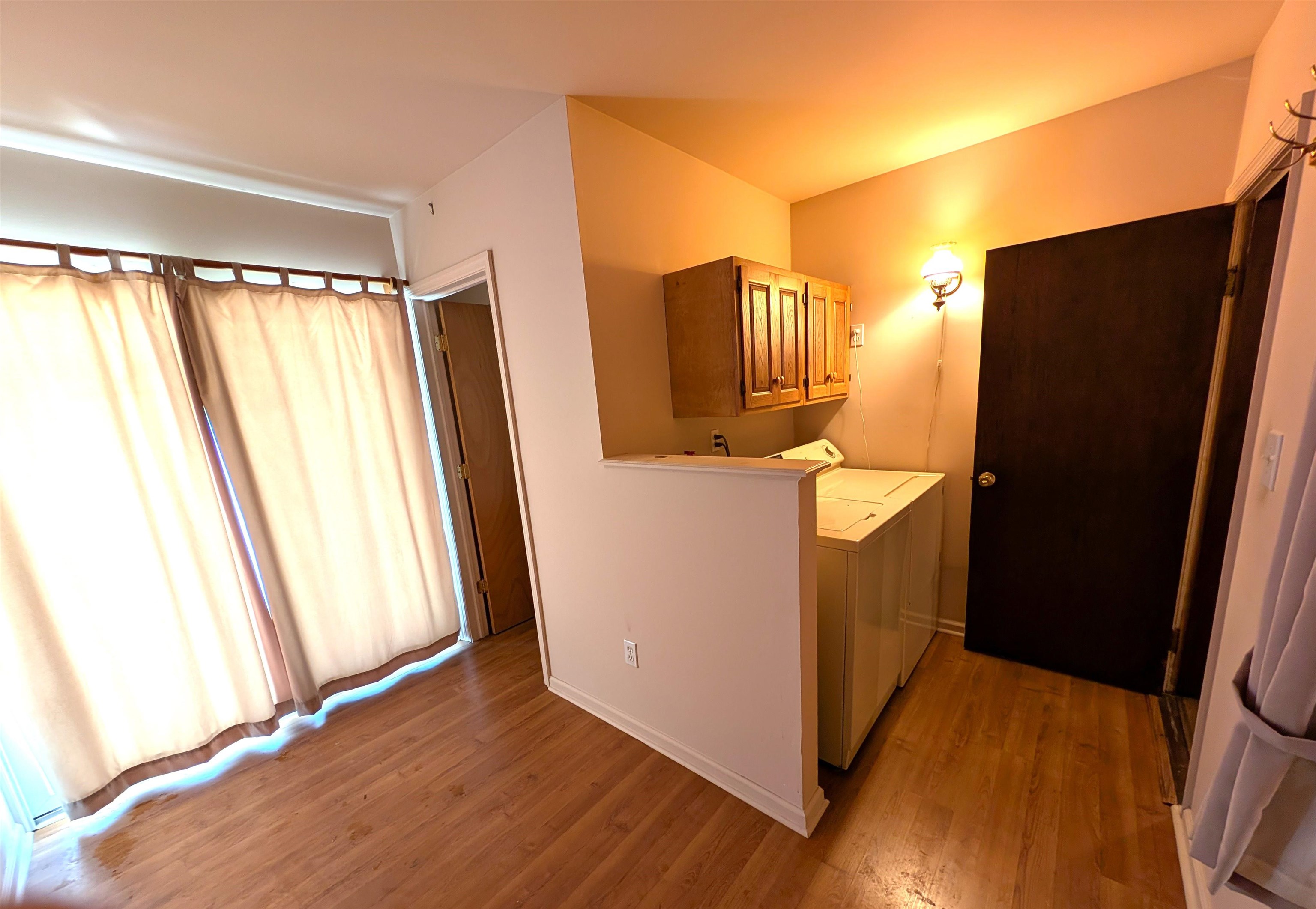 425 Davis Avenue Kearny, NJ 07032 - Photo 12 of 26 a kitchen view with wooden floor and cabinets