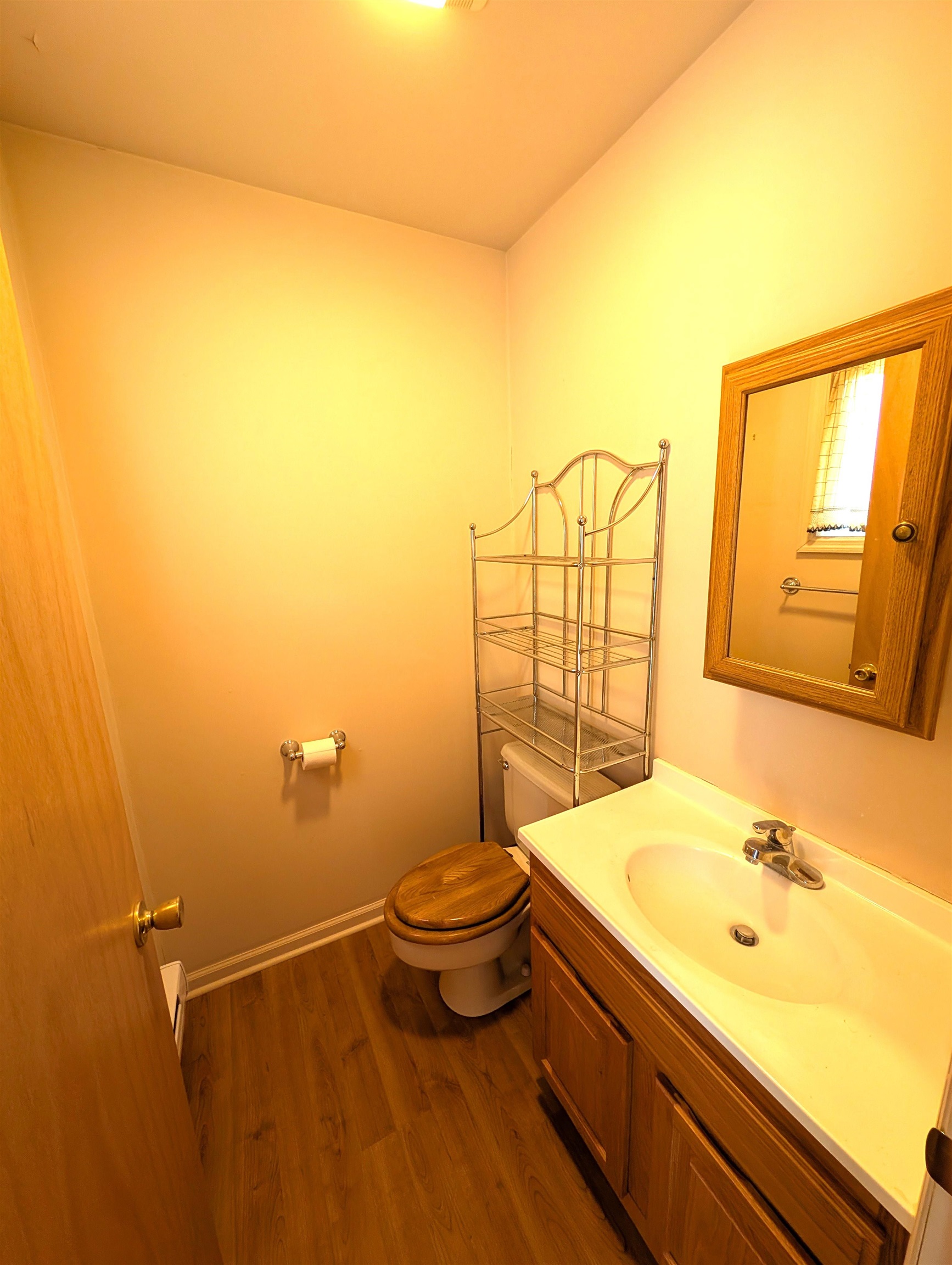 425 Davis Avenue Kearny, NJ 07032 - Photo 13 of 26 a bathroom with a sink and a toilet
