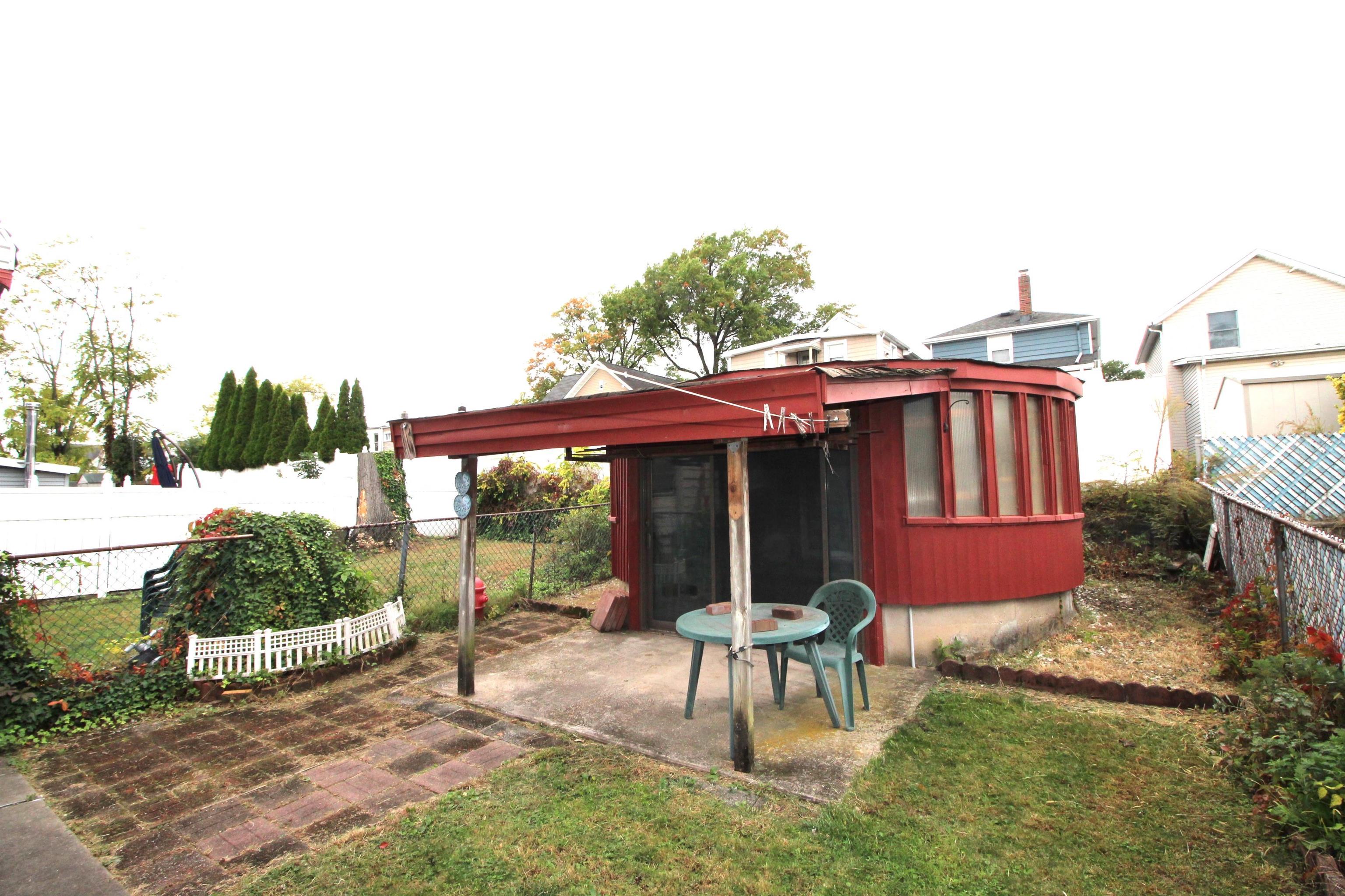 425 Davis Avenue Kearny, NJ 07032 - Photo 23 of 26 a view of a house with backyard and sitting area