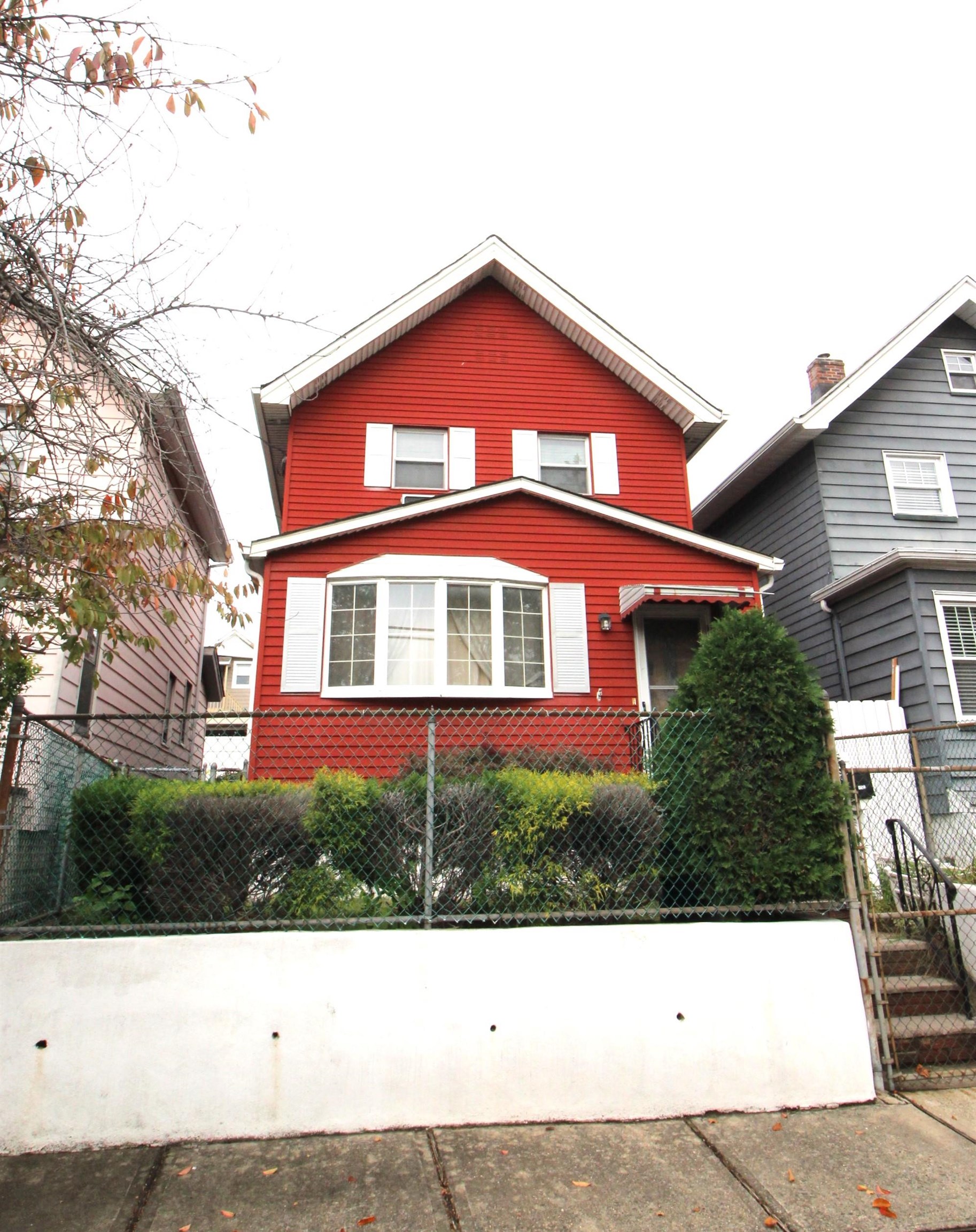 425 Davis Avenue Kearny, NJ 07032 - Photo 3 of 26 a black and white photo of a house