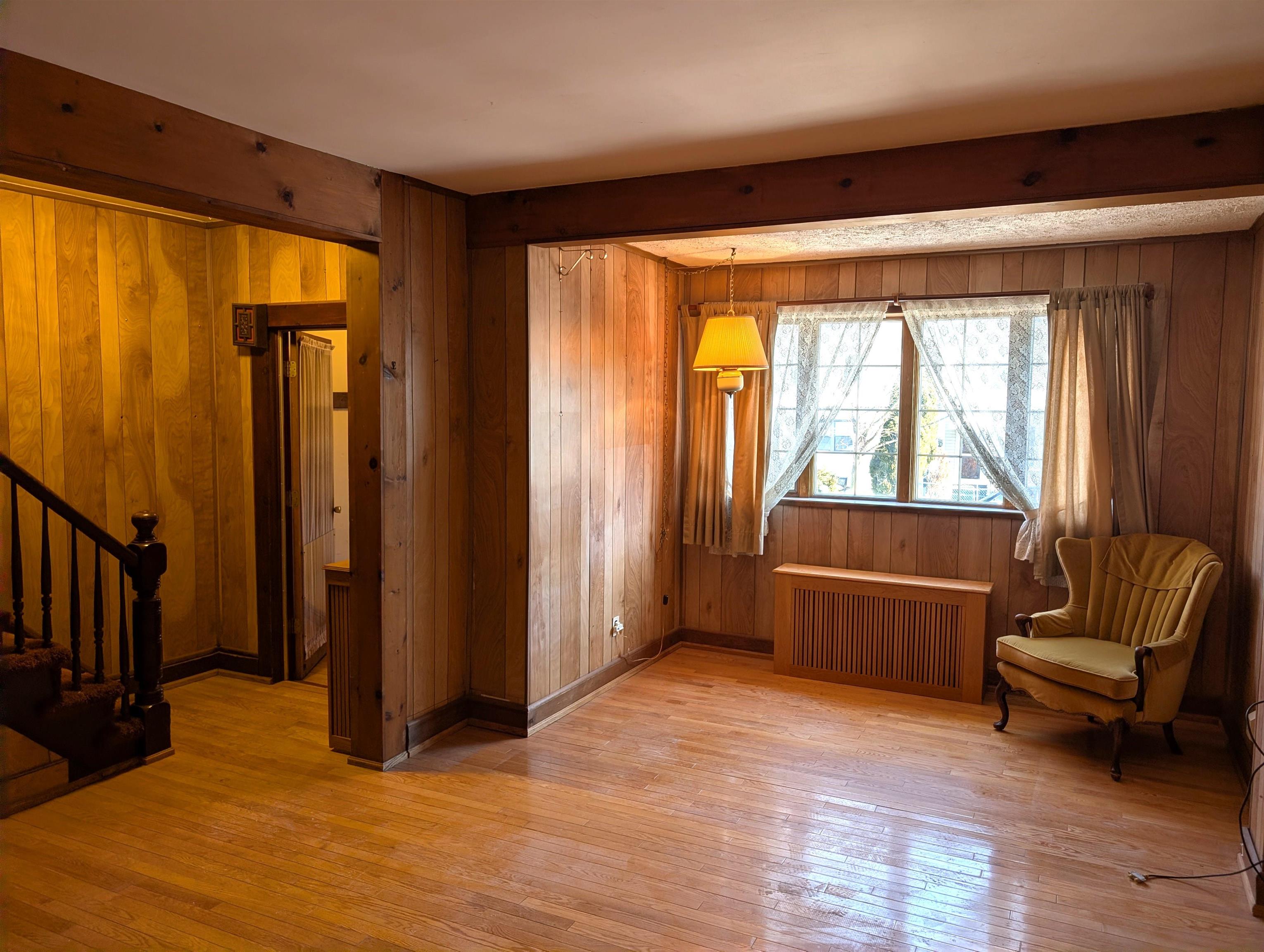425 Davis Avenue Kearny, NJ 07032 - Photo 8 of 26 a living room with furniture and large windows