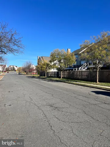 a view of a road with a yard