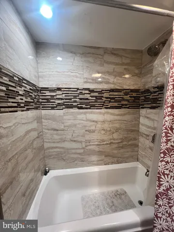 a bathroom with a bathtub