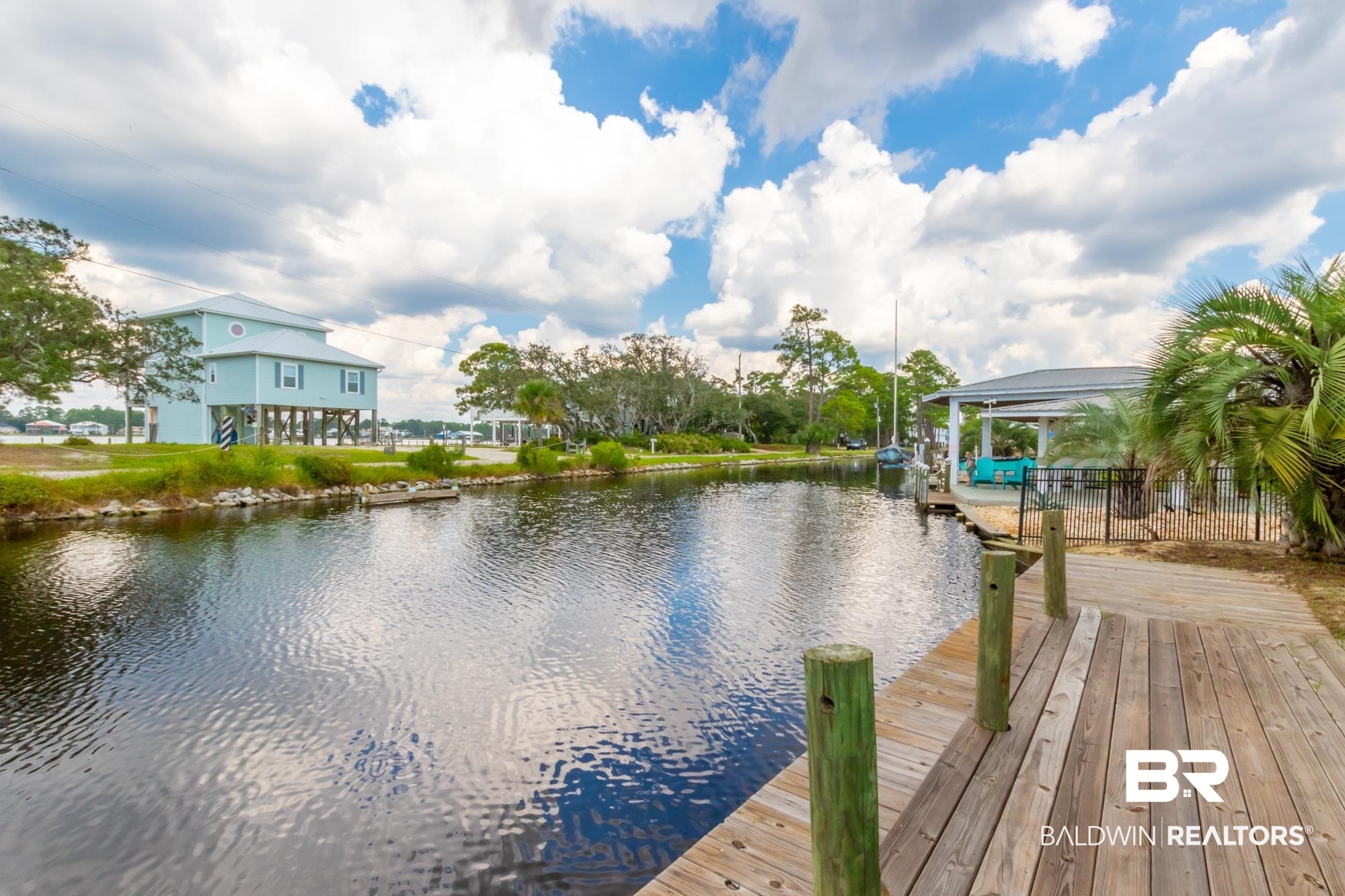 328 Windmill Ridge Road Gulf Shores, AL 36542 - Photo 39 of 47 View of dock featuring a water view