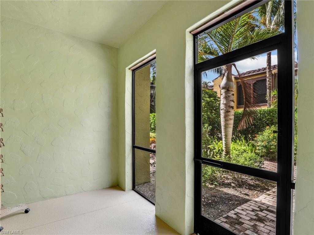 9066 Albion Lane North, Unit 5103 Naples, FL 34113 - Photo 25 of 40 a view of a front door