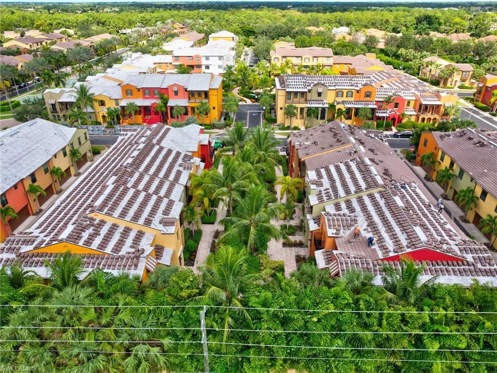 9066 Albion Lane North, Unit 5103 Naples, FL 34113 - Photo 38 of 40 an aerial view of a city