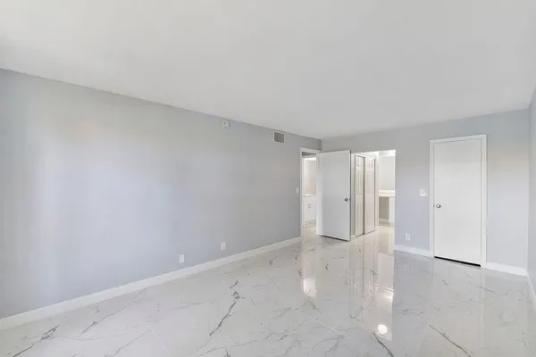 an empty room with windows