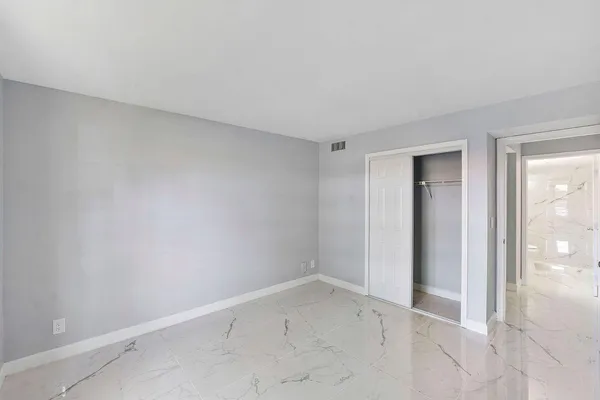 a view of an empty room with window