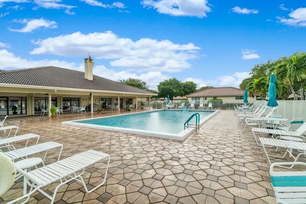 a view of outdoor space yard and swimming pool