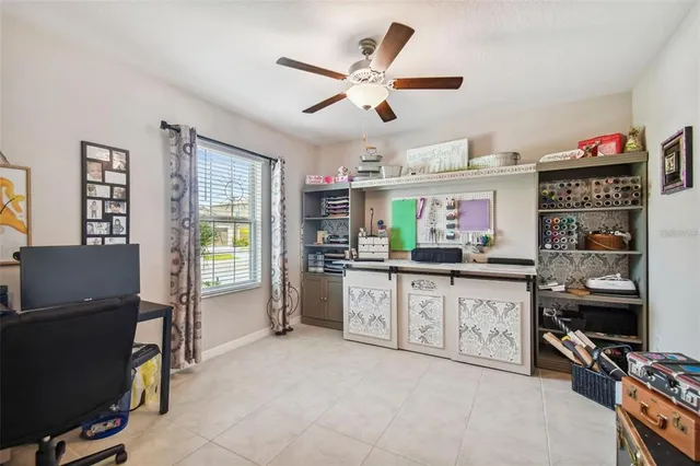 a kitchen with stainless steel appliances granite countertop a refrigerator and microwave